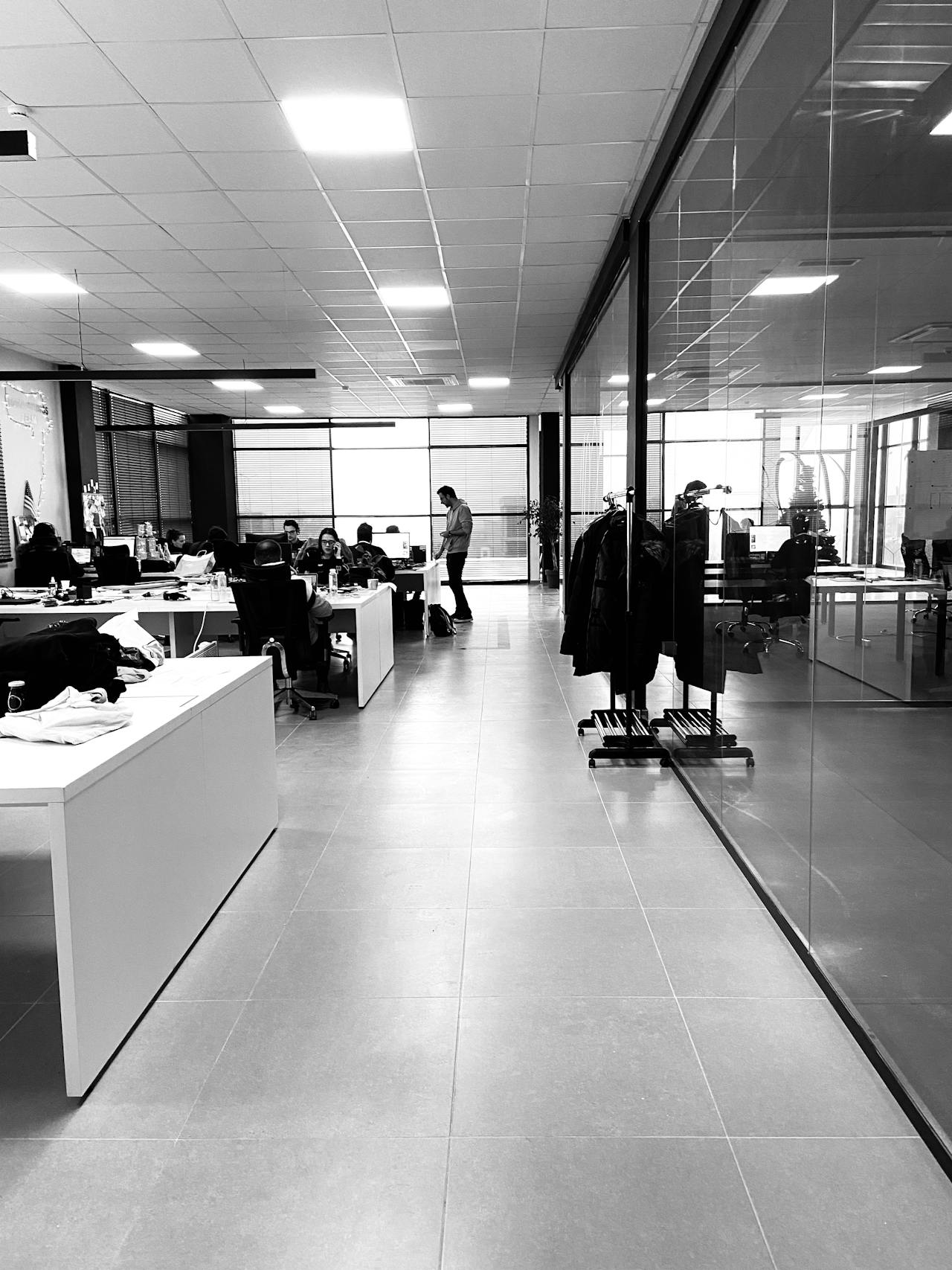 Black and white image of a workplace.a