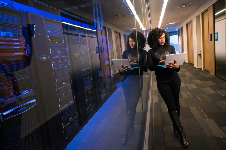 Technical employee working in the server room.